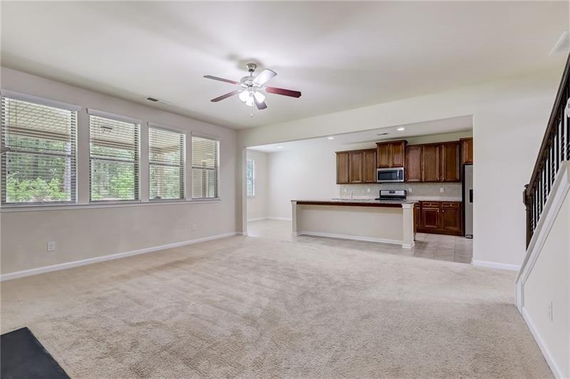2680 Ogden Trail Buford, GA 30519 - Photo 11 of 45 a view of a kitchen with a sink dishwasher and a microwave oven
