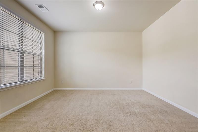 2680 Ogden Trail Buford, GA 30519 - Photo 21 of 45 an empty room with a window