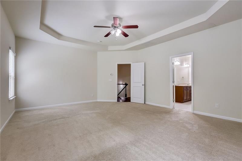 2680 Ogden Trail Buford, GA 30519 - Photo 27 of 45 a view of a livingroom with a ceiling fan and window