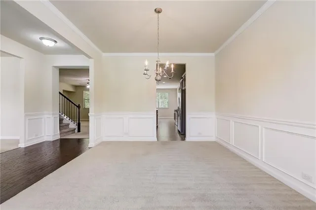 a view of a livingroom with wooden floor