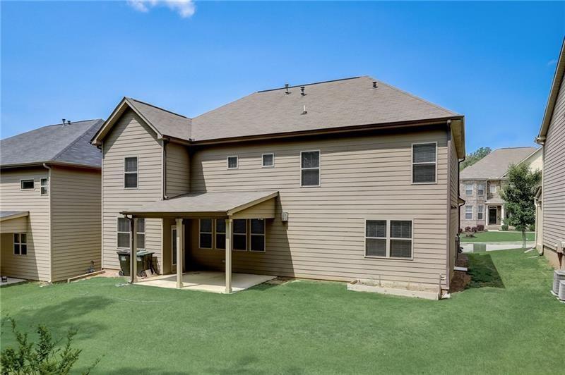 2680 Ogden Trail Buford, GA 30519 - Photo 45 of 45 a front view of a house with a yard