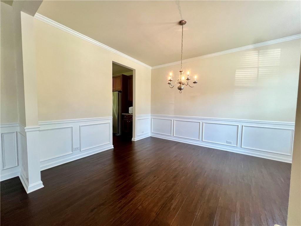 2680 Ogden Trail Buford, GA 30519 - Photo 5 of 45 a view of a livingroom with wooden floor