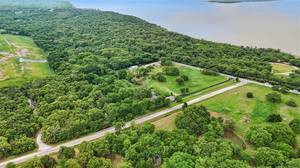 0 Turner Road Cross Roads, TX 76227 - Photo 3 of 18 a view of a green yard with large trees