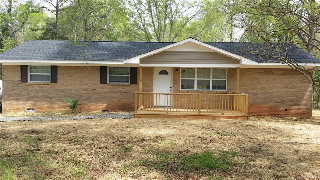 1929 State Rd S-29-584 Lancaster, SC 29720 - Photo 1 of 15 a front view of a house with a yard