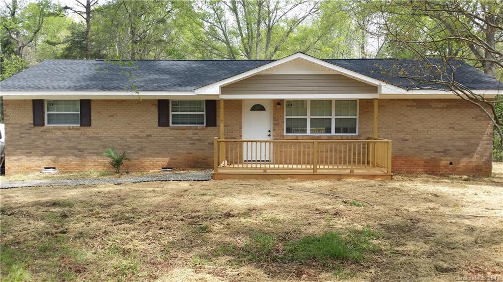 1929 State Rd S-29-584 Lancaster, SC 29720 - Photo 2 of 15 a front view of a house with a yard
