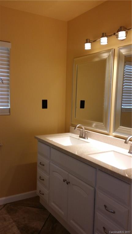 1929 State Rd S-29-584 Lancaster, SC 29720 - Photo 13 of 15 a bathroom with a sink and a mirror