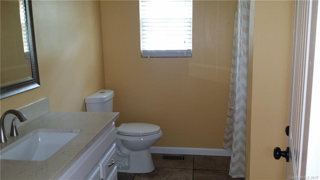 1929 State Rd S-29-584 Lancaster, SC 29720 - Photo 10 of 15 a bathroom with a sink and toilet
