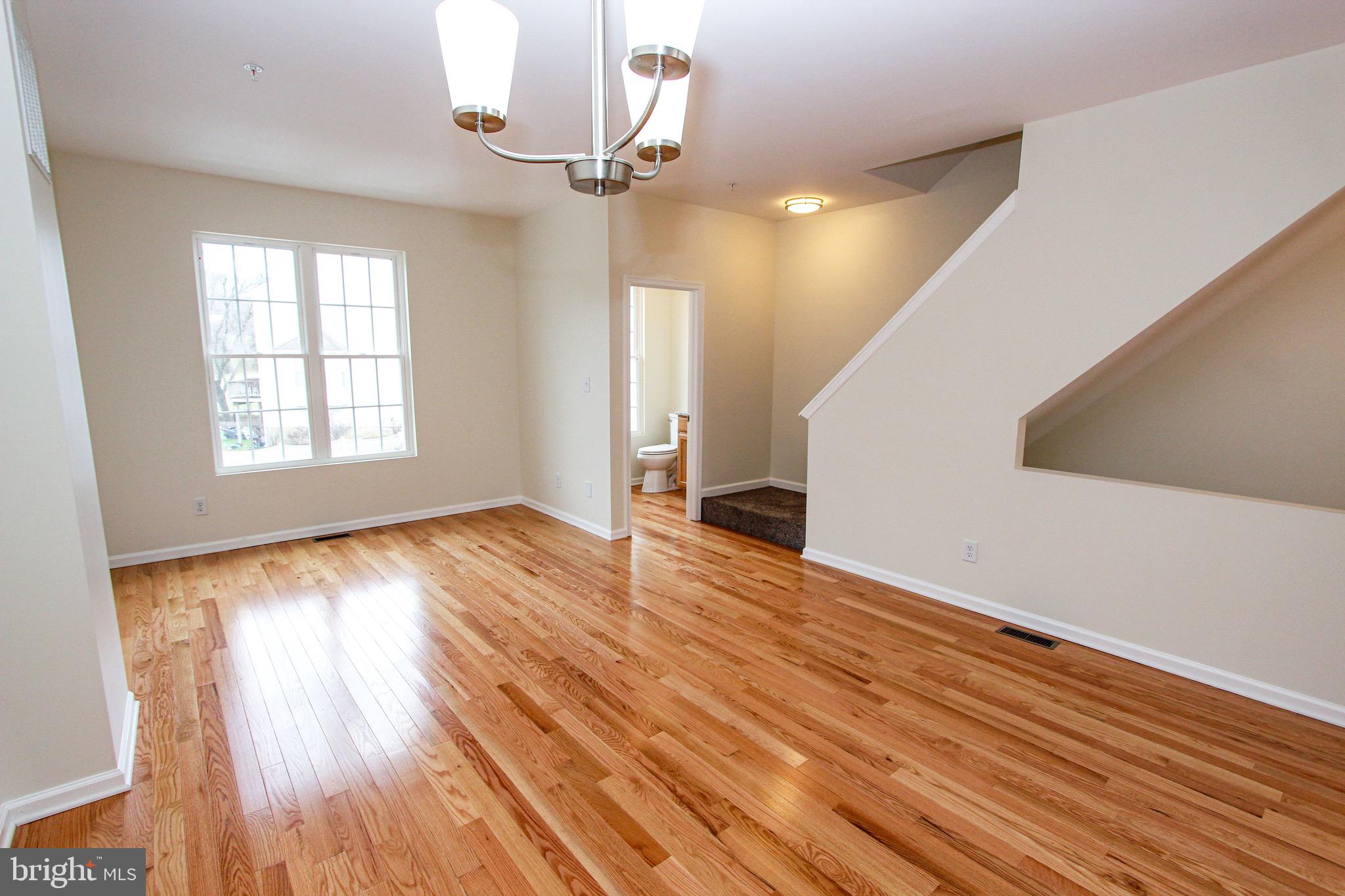 4 Whitetail Way Elkton, MD 21921 - Photo 15 of 28 an empty room with wooden floor and windows