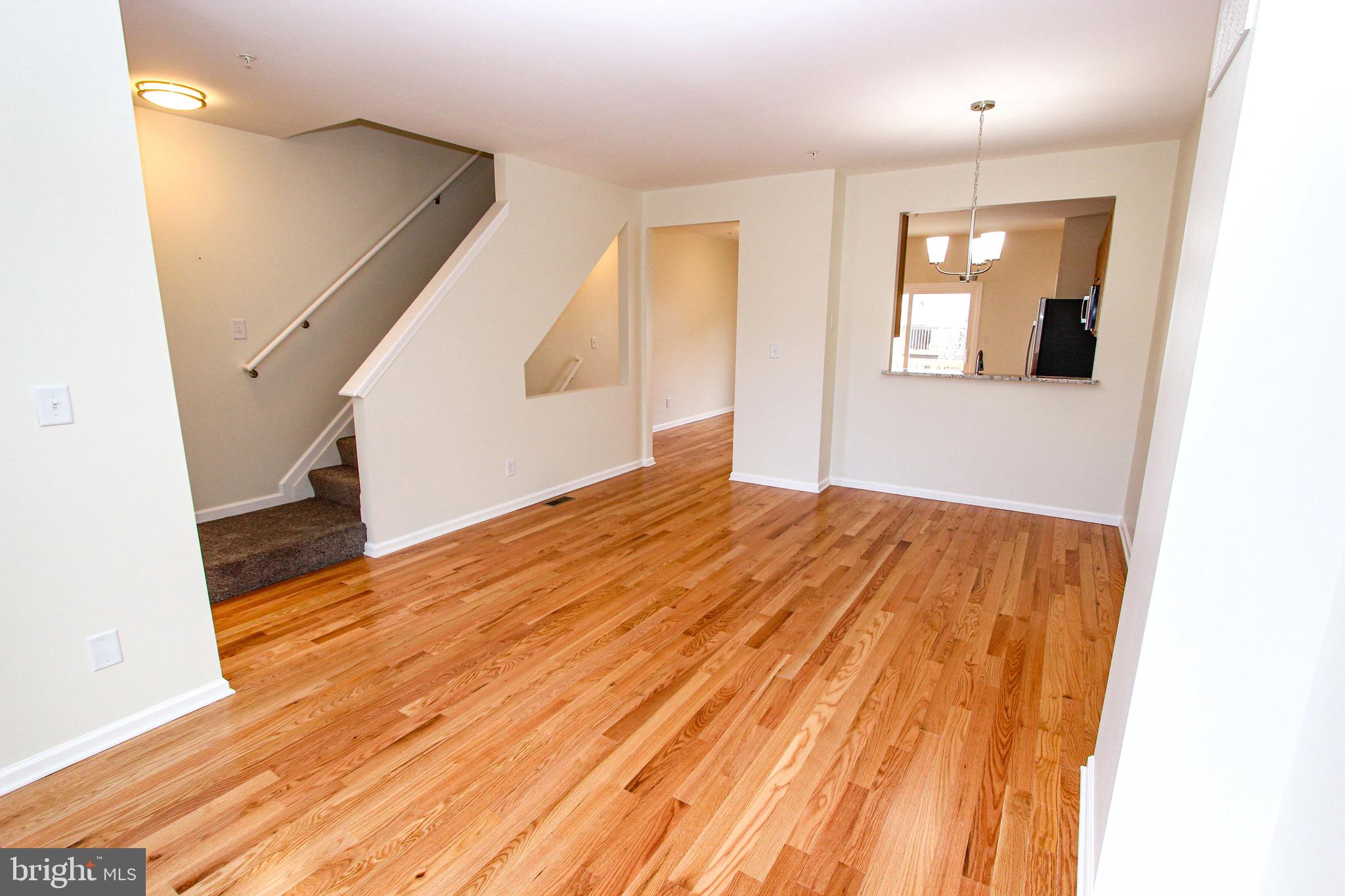4 Whitetail Way Elkton, MD 21921 - Photo 16 of 28 a view of a room with wooden floor and staircase