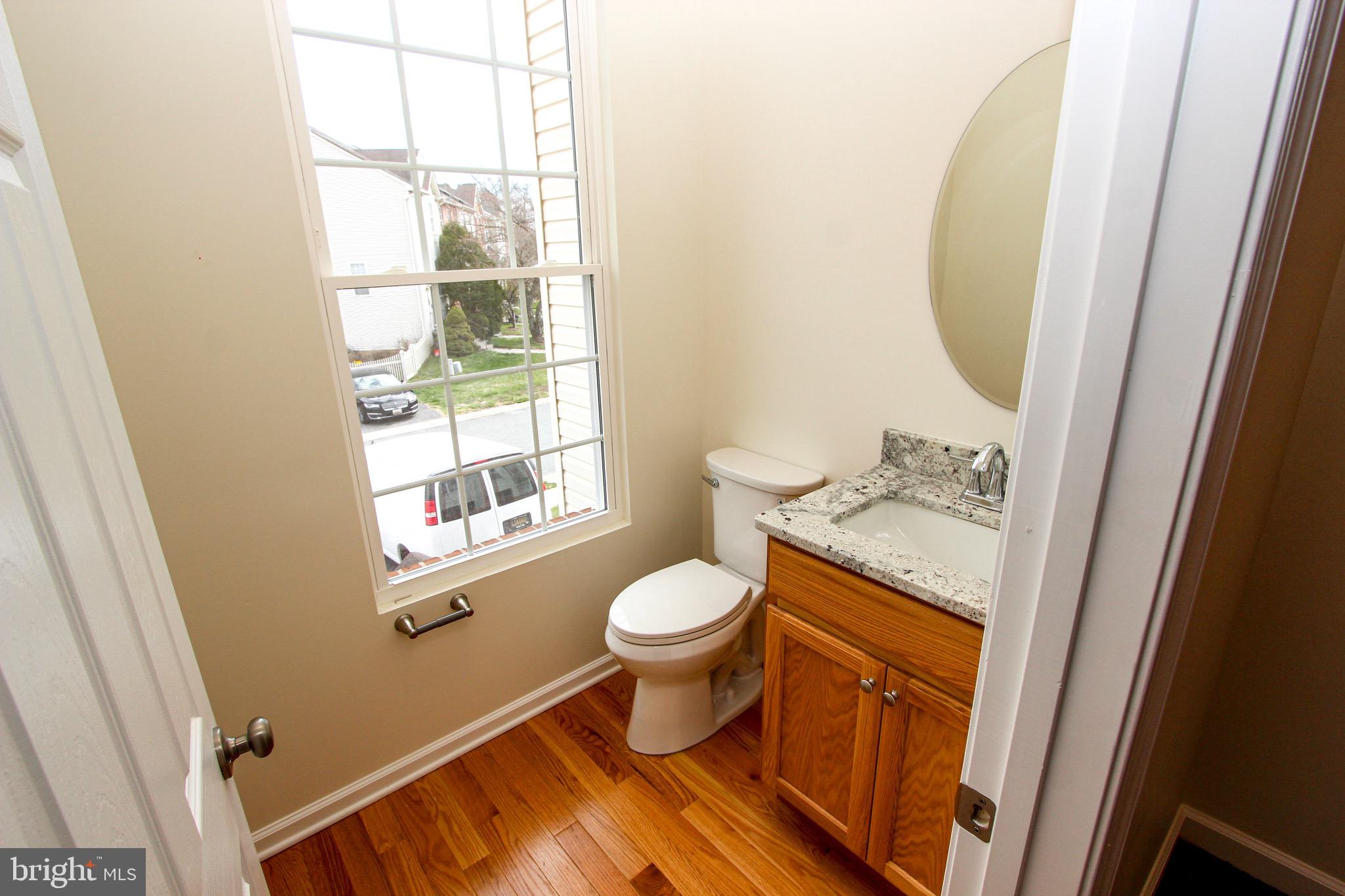 4 Whitetail Way Elkton, MD 21921 - Photo 17 of 28 a bathroom with a granite countertop toilet and a sink