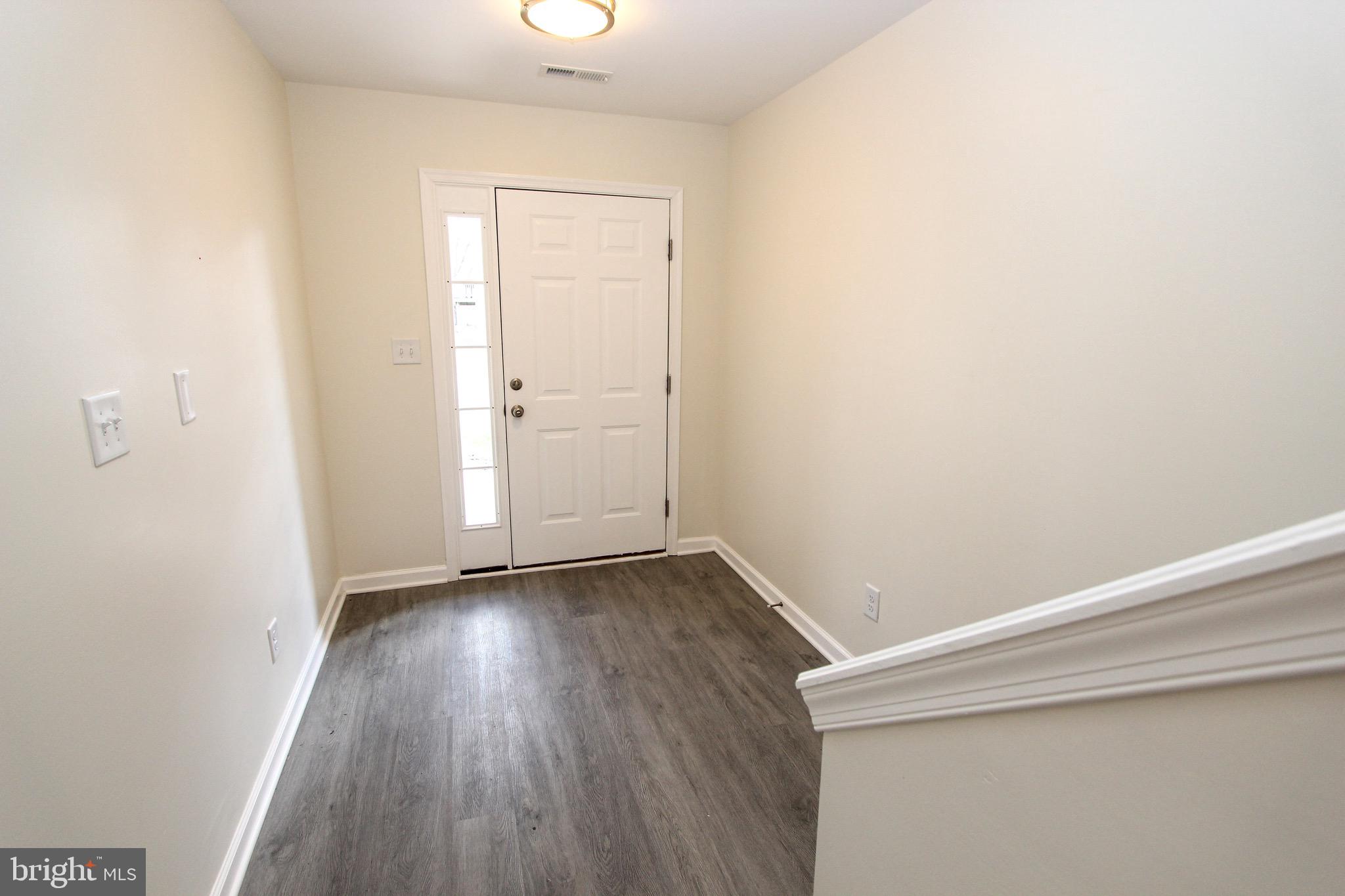 4 Whitetail Way Elkton, MD 21921 - Photo 6 of 28 a view of an empty room with wooden floor