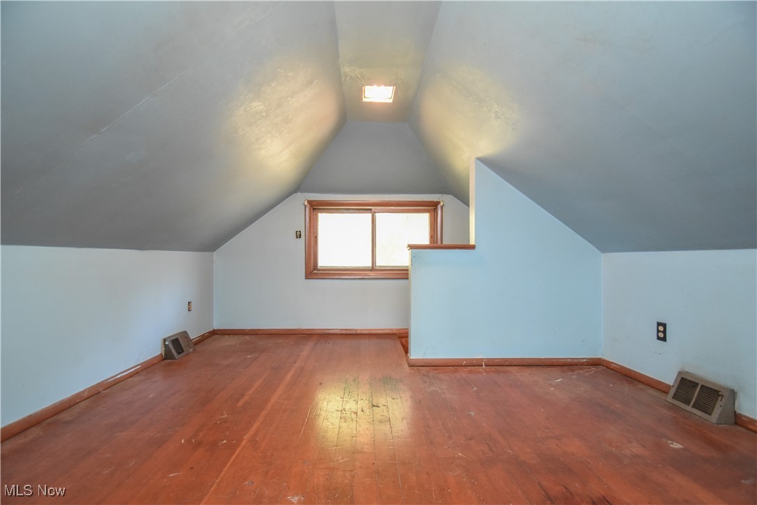 5382 West Webb Road Youngstown, OH 44515 - Photo 47 of 50 Bonus room featuring vaulted ceiling and wood-type flooring