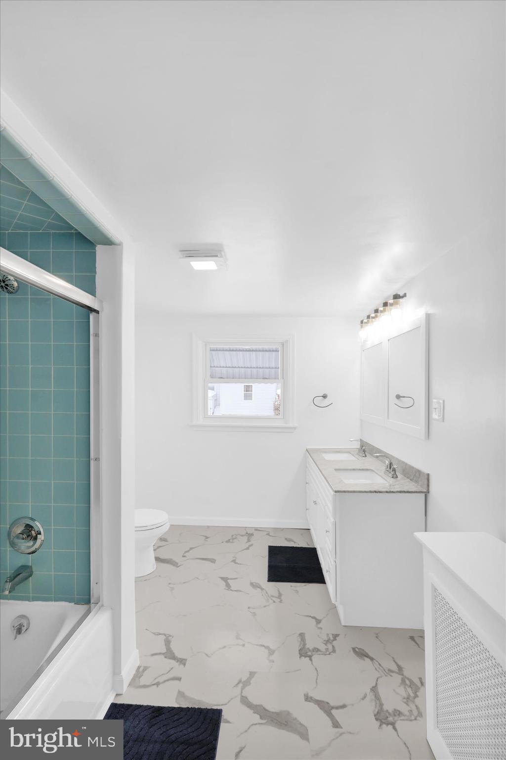 42 Chestnut Street Mohnton, PA 19540 - Photo 28 of 30 a bathroom with a bathtub sink mirror and toilet
