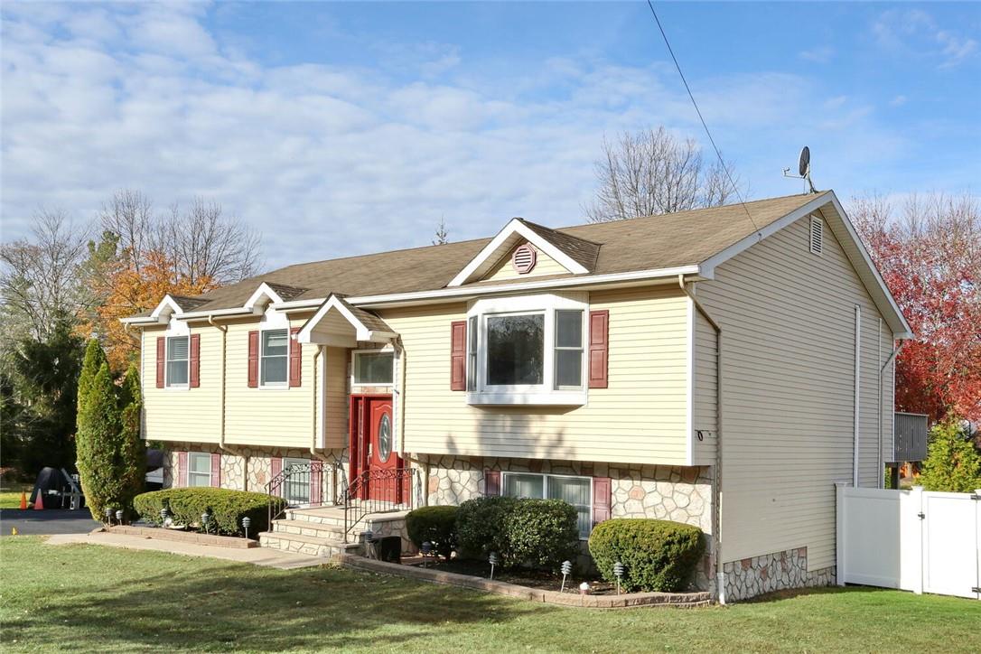 114 Lake Road Congers, NY 10920 - Photo 1 of 1 Raised ranch with a front yard