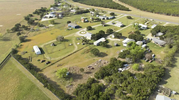 a view of swimming pool with a yard