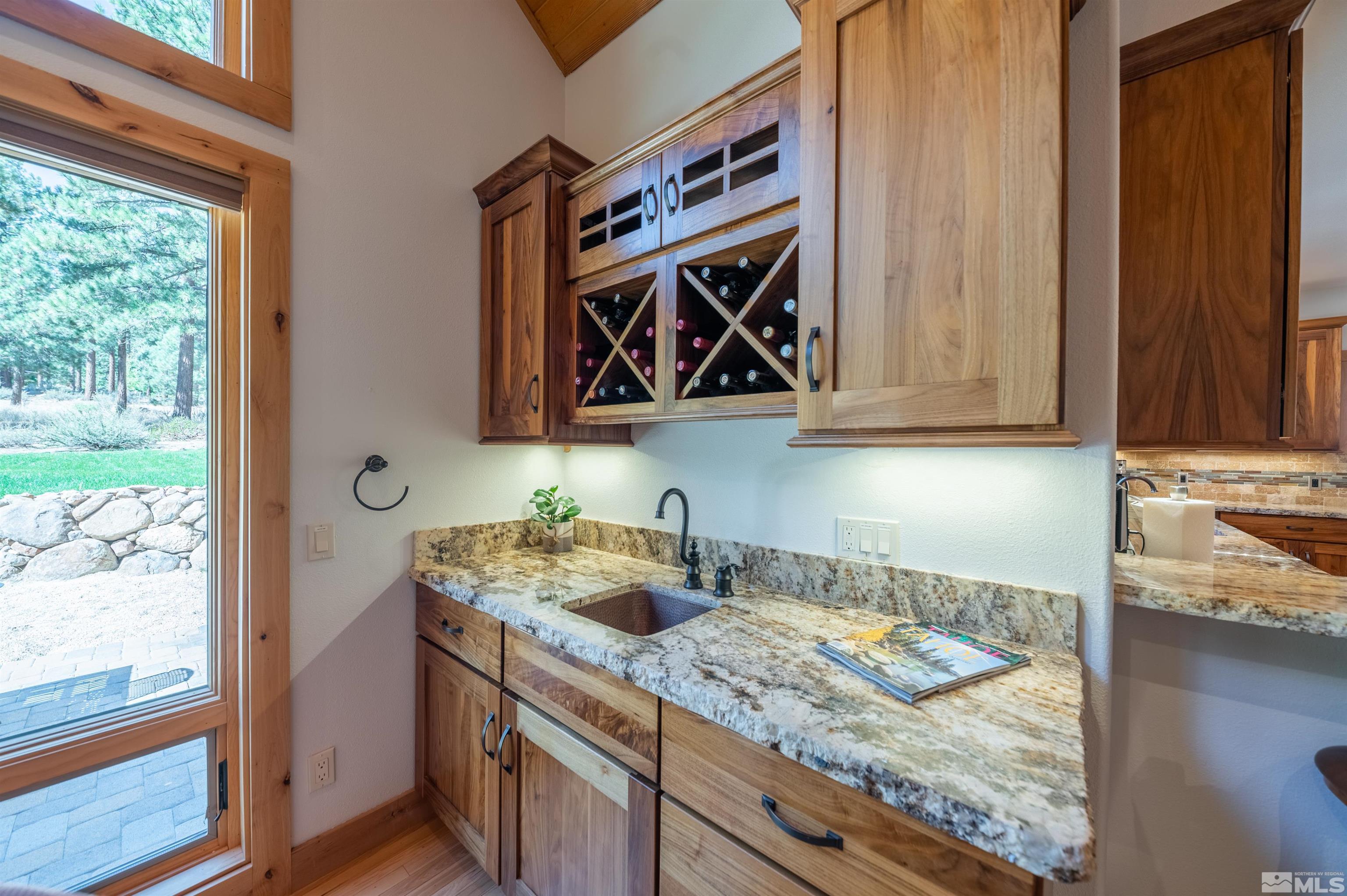 500 Yellow Pine Road Reno, NV 89511 - Photo 11 of 40 a kitchen with stainless steel appliances granite countertop a sink and cabinets