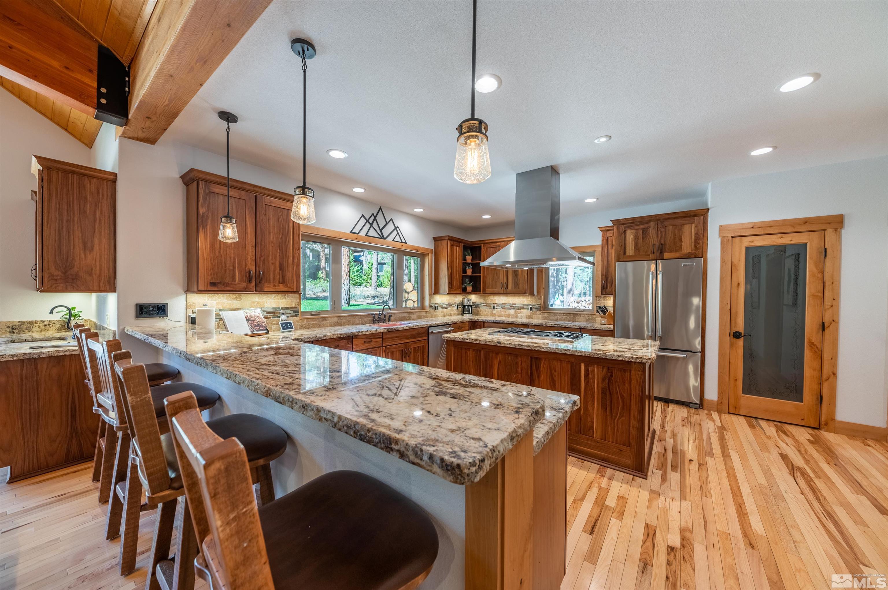 500 Yellow Pine Road Reno, NV 89511 - Photo 12 of 40 a large kitchen with a table and chairs