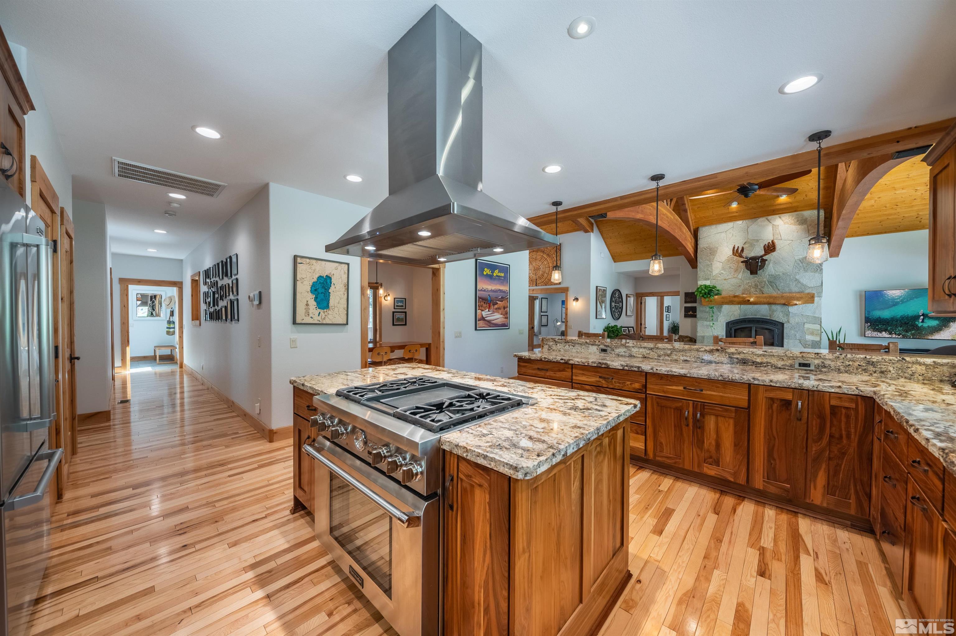 500 Yellow Pine Road Reno, NV 89511 - Photo 14 of 40 a kitchen with stainless steel appliances granite countertop a stove and a sink