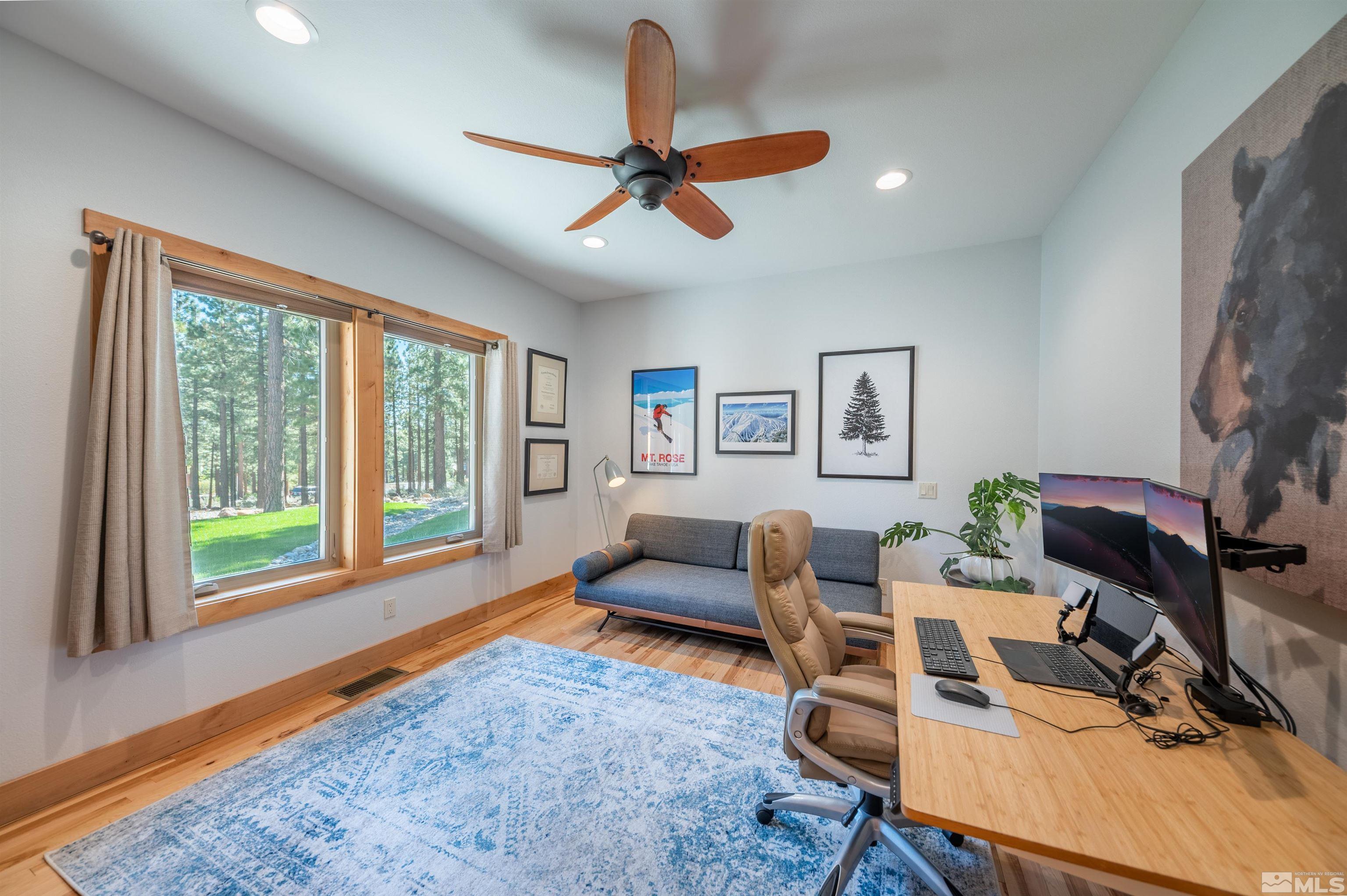 500 Yellow Pine Road Reno, NV 89511 - Photo 26 of 40 a living room with furniture and a floor to ceiling window