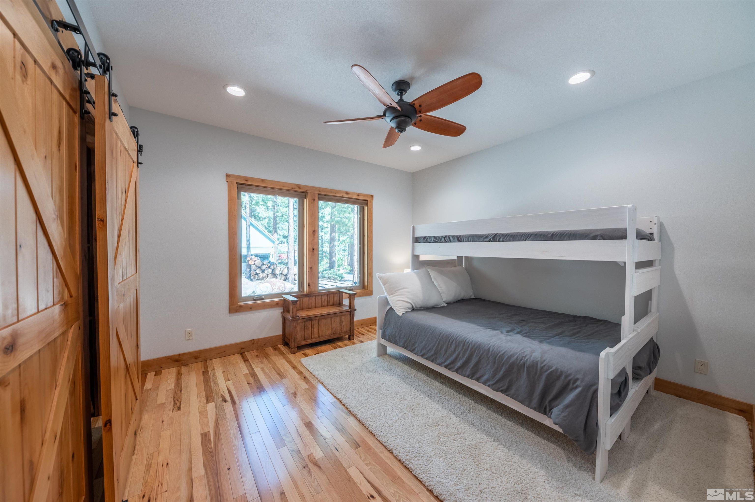 500 Yellow Pine Road Reno, NV 89511 - Photo 27 of 40 a bedroom with a bed and a window
