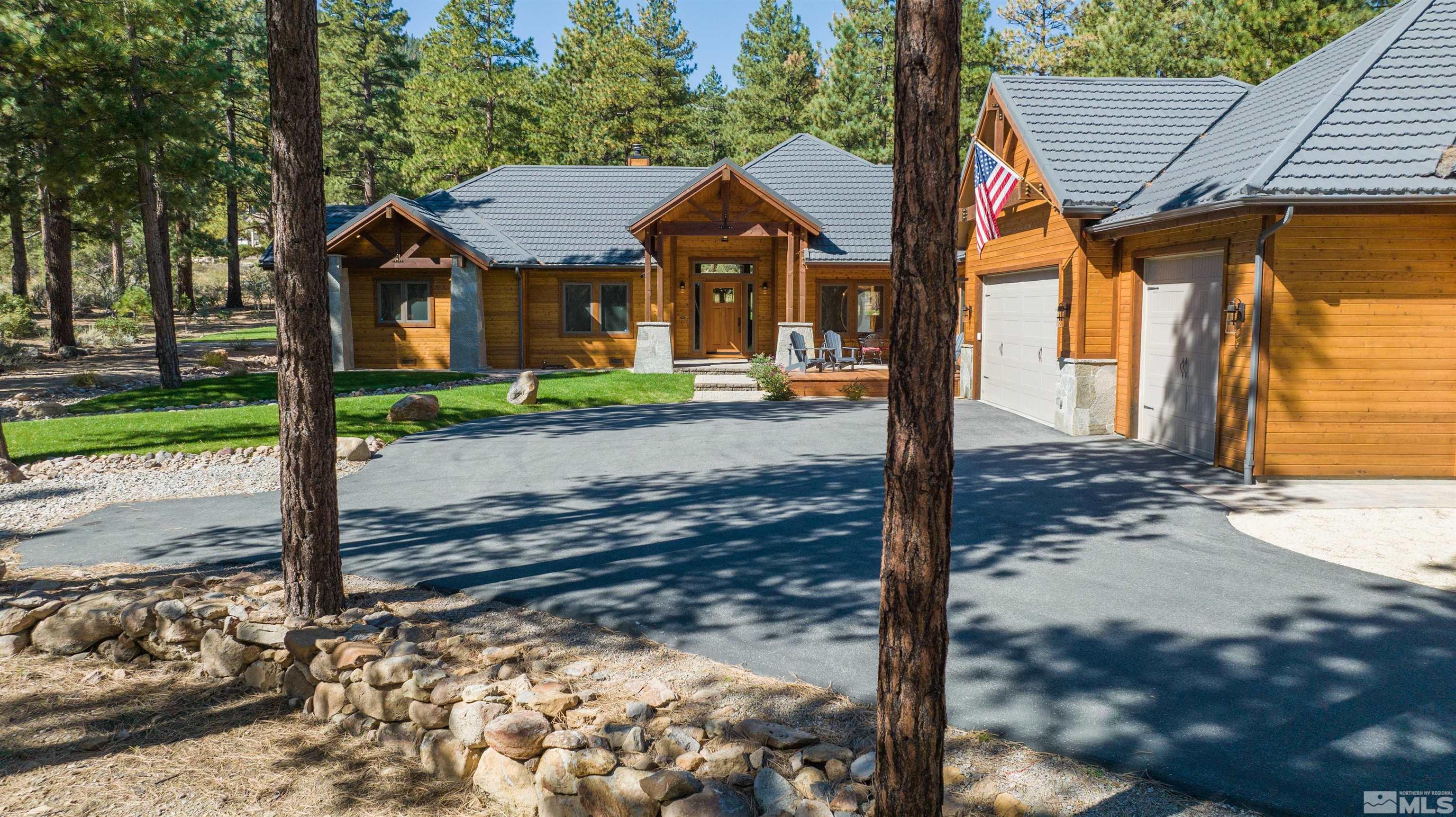 500 Yellow Pine Road Reno, NV 89511 - Photo 3 of 40 a front view of a house with garden
