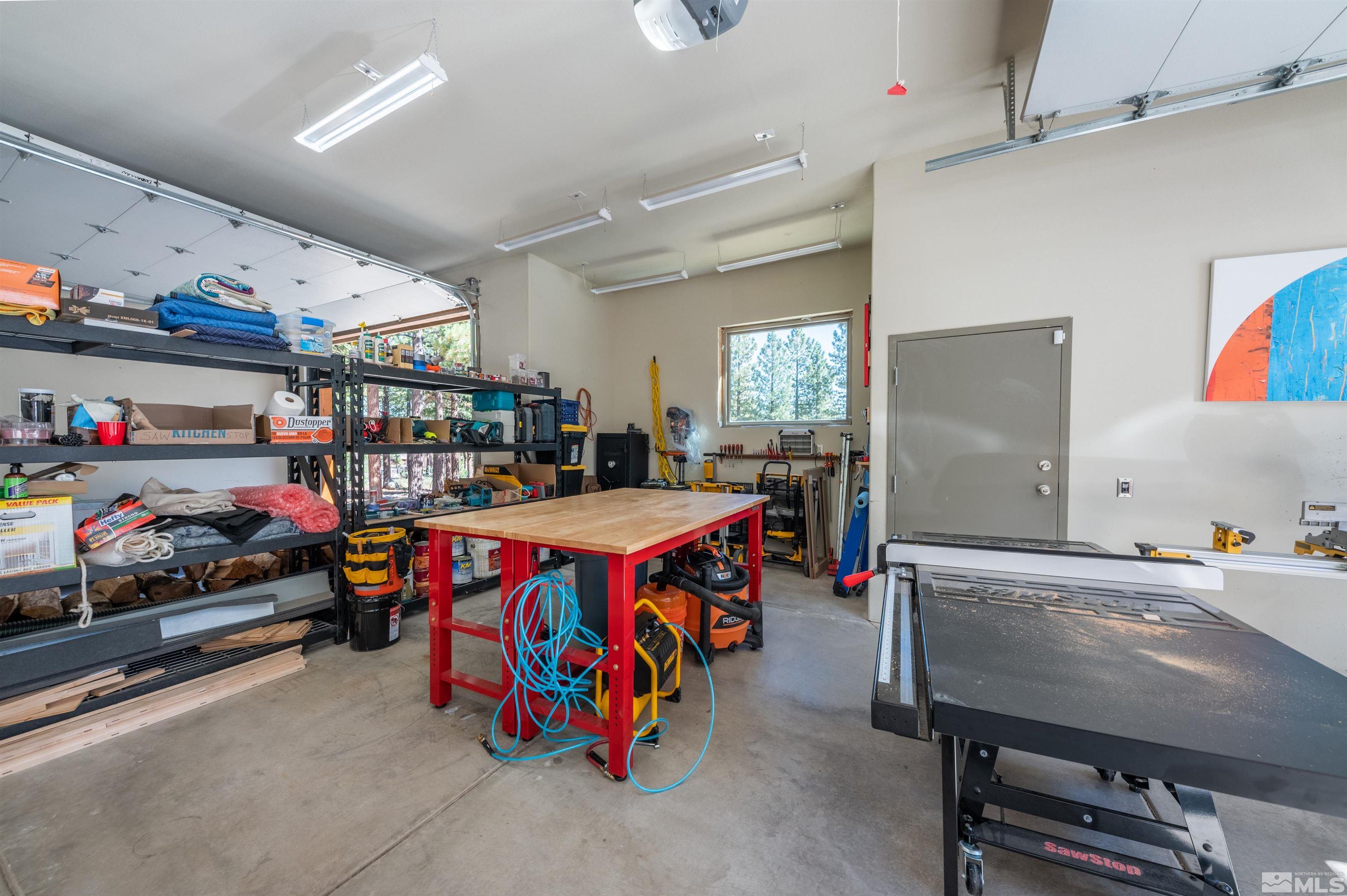 500 Yellow Pine Road Reno, NV 89511 - Photo 33 of 40 a utility room with lots of furniture and toys