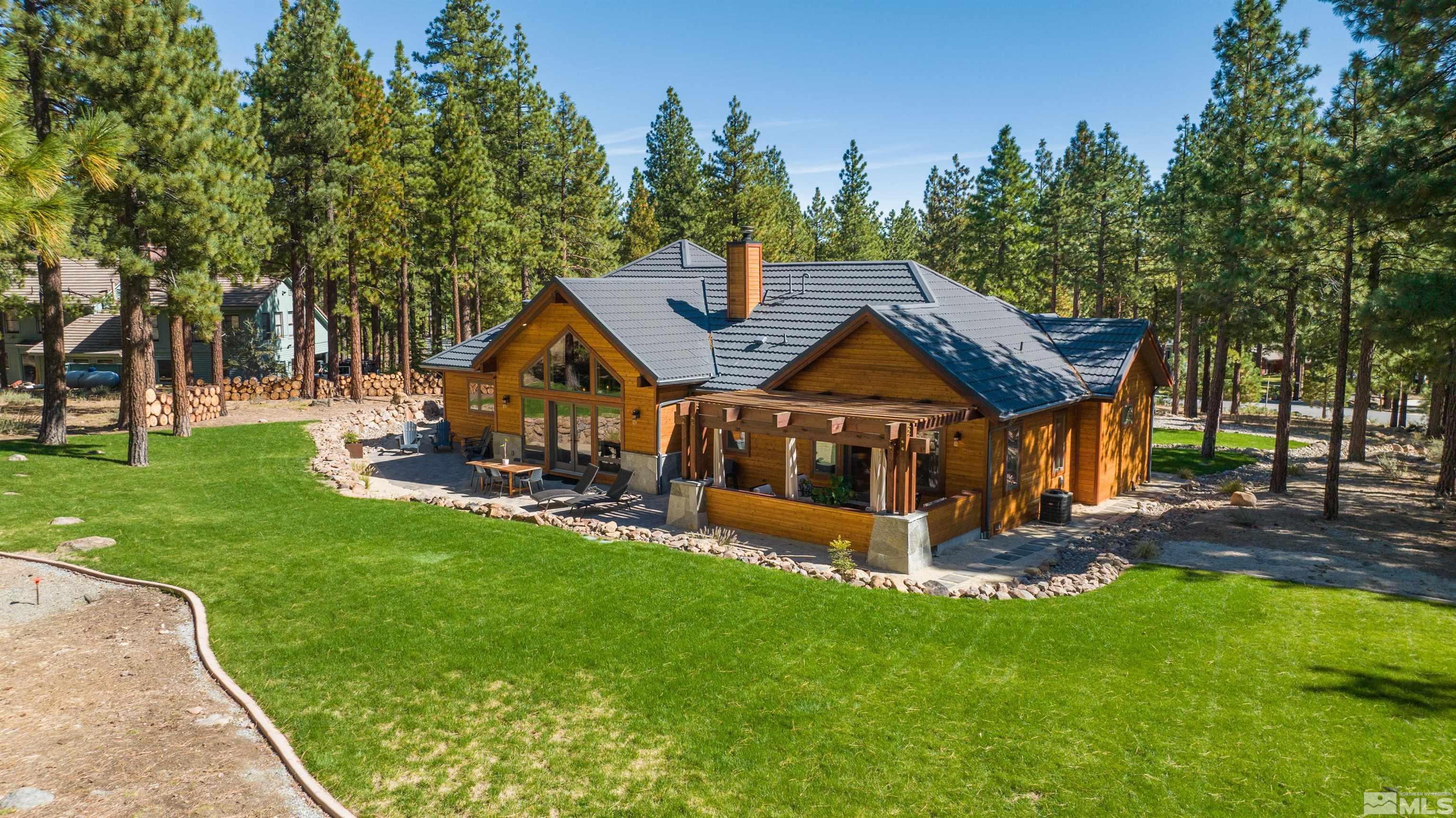 500 Yellow Pine Road Reno, NV 89511 - Photo 37 of 40 a view of a house with backyard and a tree