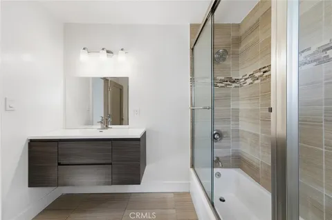 a bathroom with a shower and a toilet