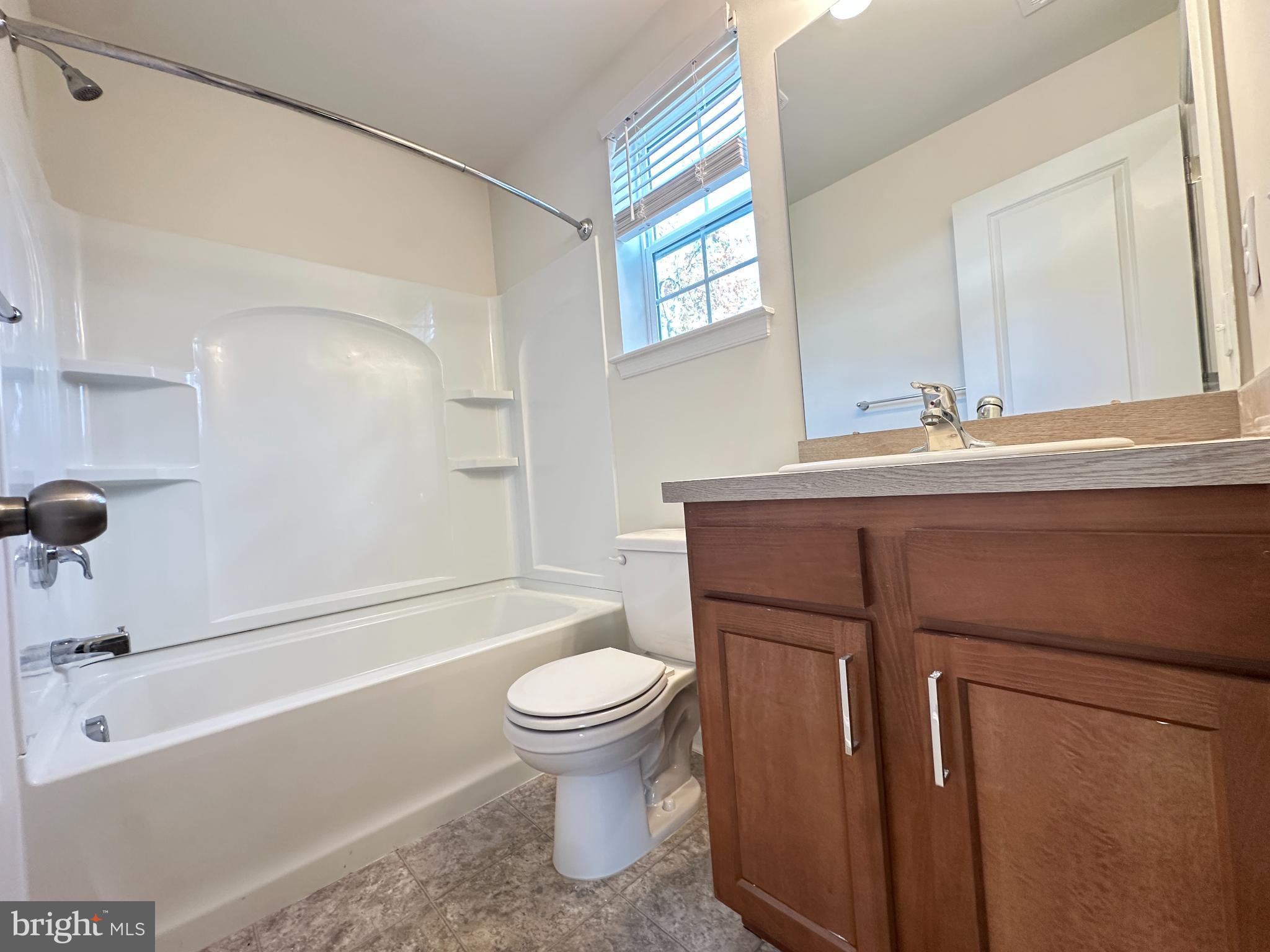377 Minck Avenue West Berlin, NJ 08091 - Photo 11 of 24 a bathroom with a sink a toilet and a bathtub