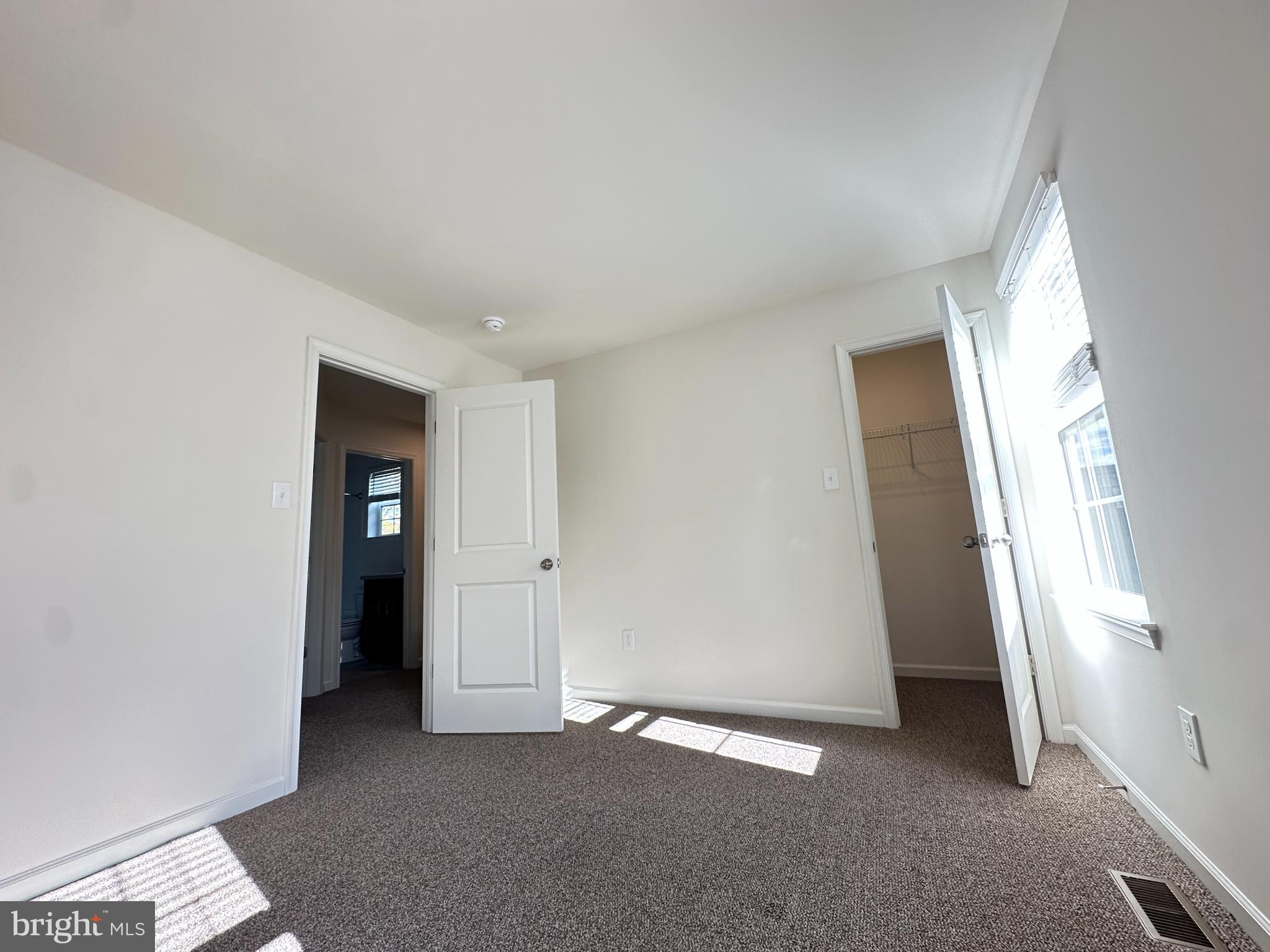 377 Minck Avenue West Berlin, NJ 08091 - Photo 15 of 24 an empty room with windows and closet