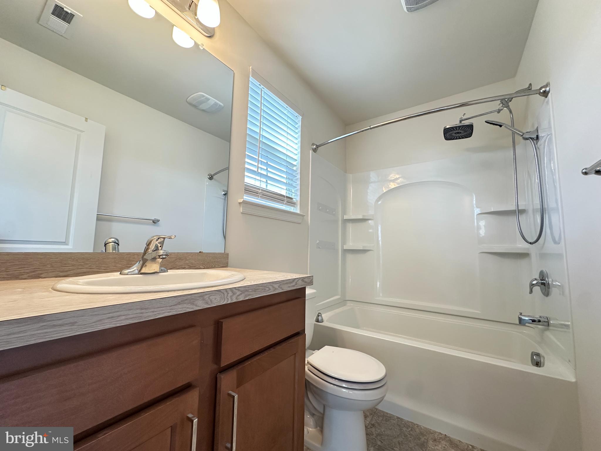 377 Minck Avenue West Berlin, NJ 08091 - Photo 17 of 24 a bathroom with a sink a toilet and shower