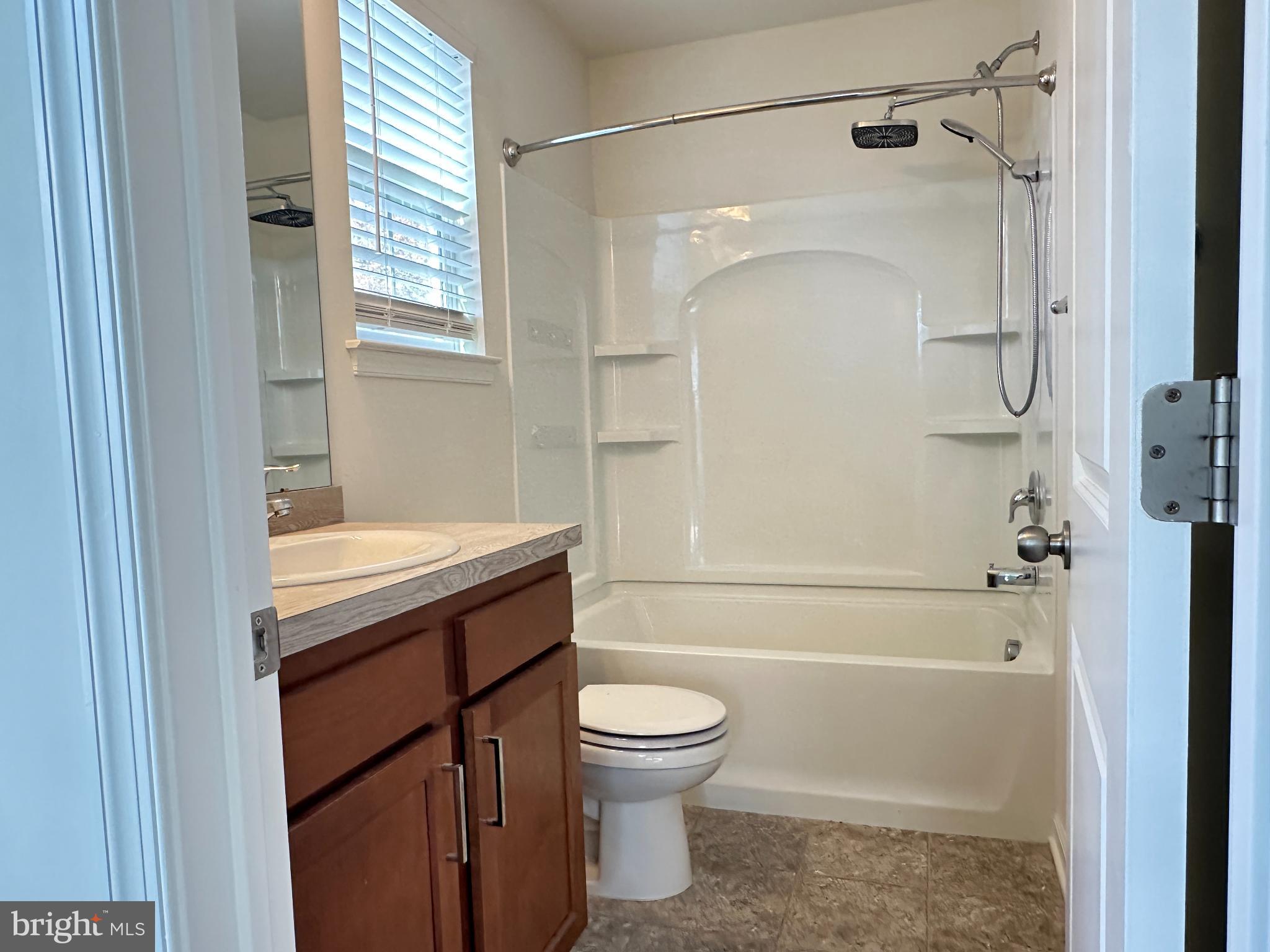 377 Minck Avenue West Berlin, NJ 08091 - Photo 18 of 24 a bathroom with a granite countertop toilet sink and shower