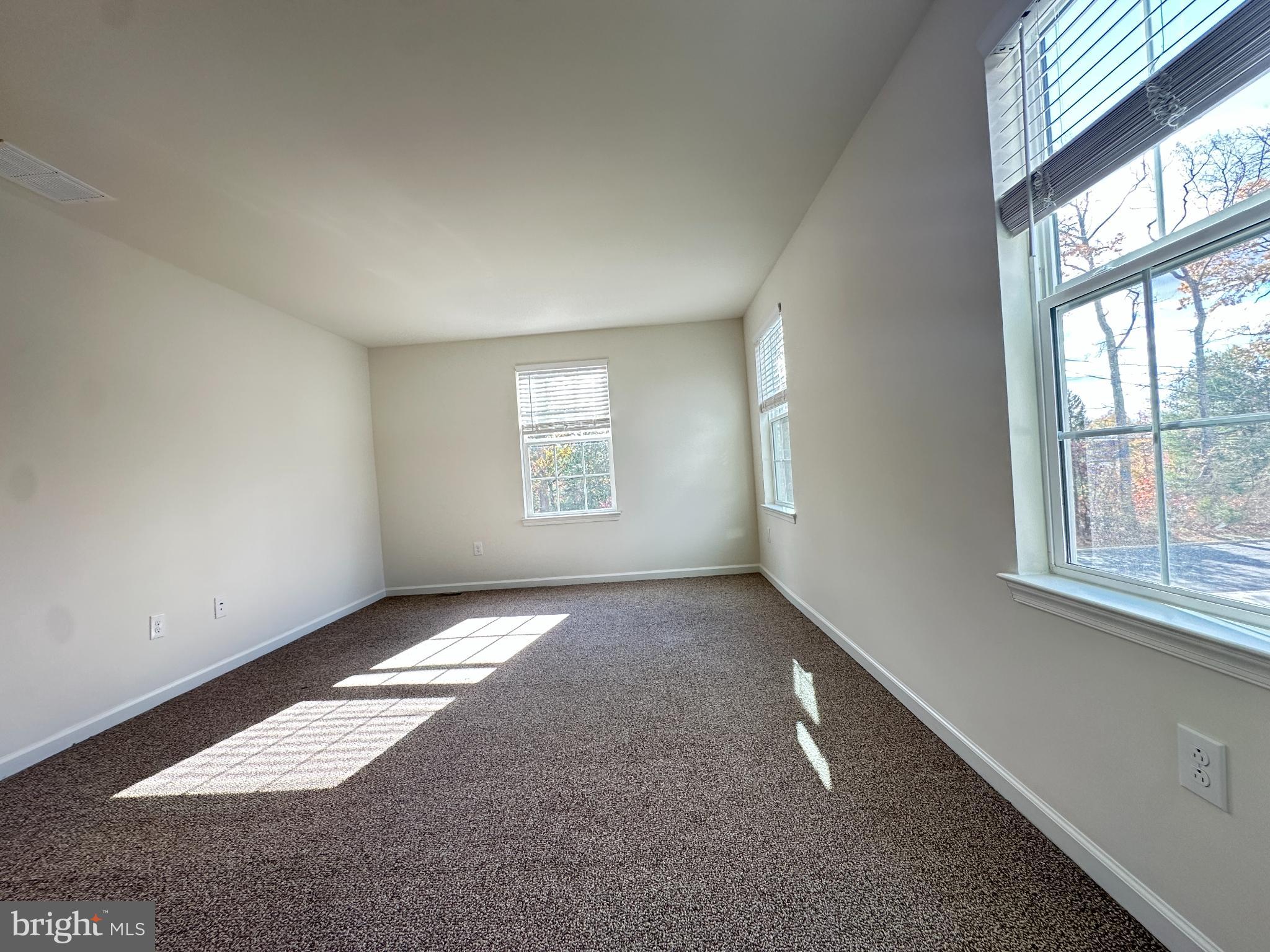377 Minck Avenue West Berlin, NJ 08091 - Photo 19 of 24 an empty room with windows