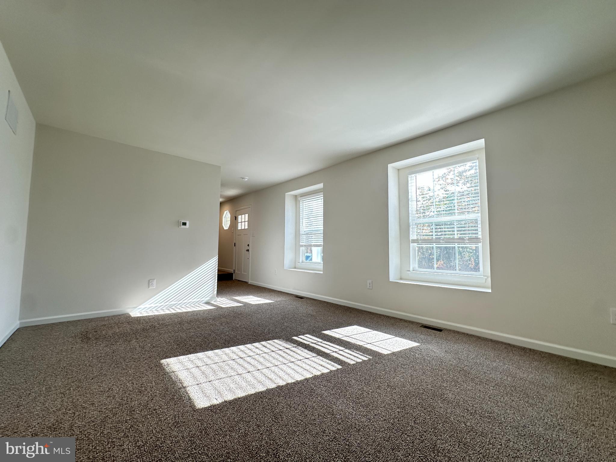 377 Minck Avenue West Berlin, NJ 08091 - Photo 6 of 24 a view of an empty room with a window