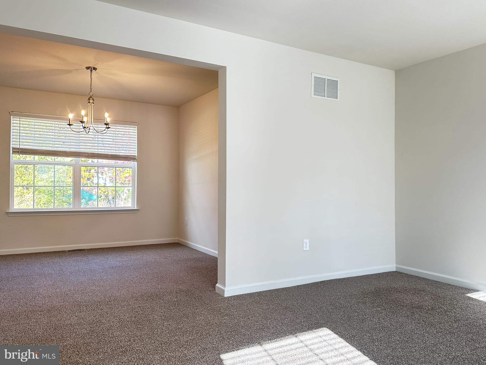 377 Minck Avenue West Berlin, NJ 08091 - Photo 7 of 24 a view of an empty room with a window