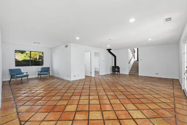a view of an empty room and window