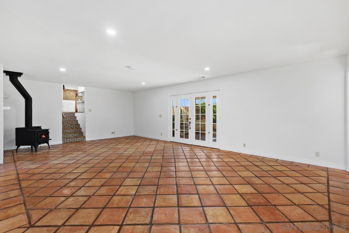 13747 Little Pond Road Valley Center, CA 92082 - Photo 15 of 39 a view of an empty room and window