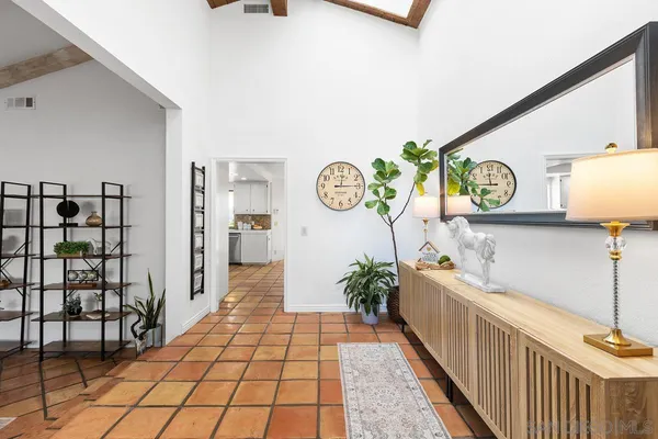 a view of a hallway to a house