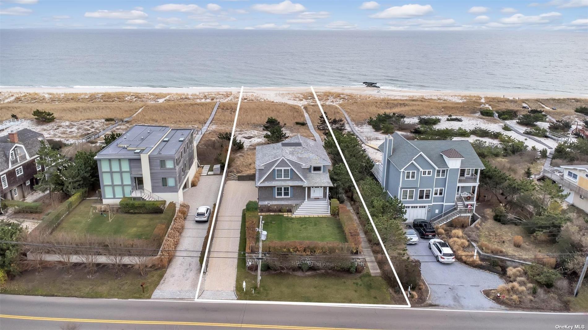 493 Dune Road Westhampton Beach, NY 11978 - Photo 1 of 11 an aerial view of residential houses with outdoor space