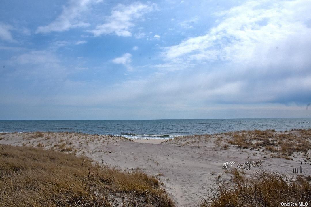 493 Dune Road Westhampton Beach, NY 11978 - Photo 7 of 11 a view of ocean view with beach