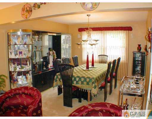 114 South Cliff Road Colonia, NJ 07067 - Photo 3 of 10 a view of a dining room with furniture