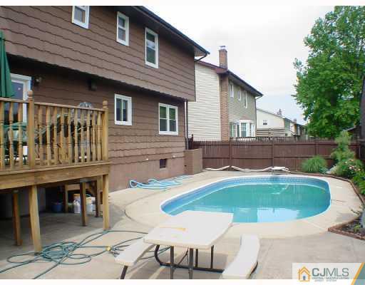 114 South Cliff Road Colonia, NJ 07067 - Photo 10 of 10 a view of a house with pool table and chairs