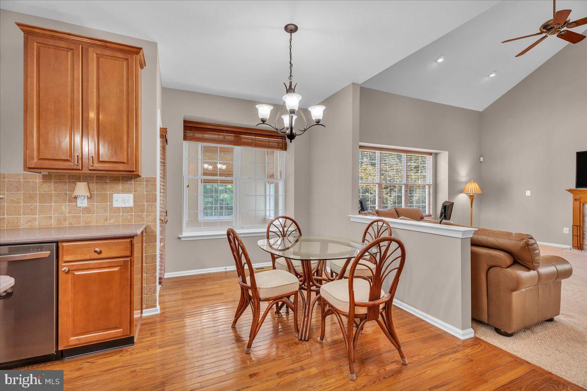 68 Hillside Lane Mount Laurel, NJ 08054 - Photo 12 of 36 a view of a dining room with furniture window and wooden floor