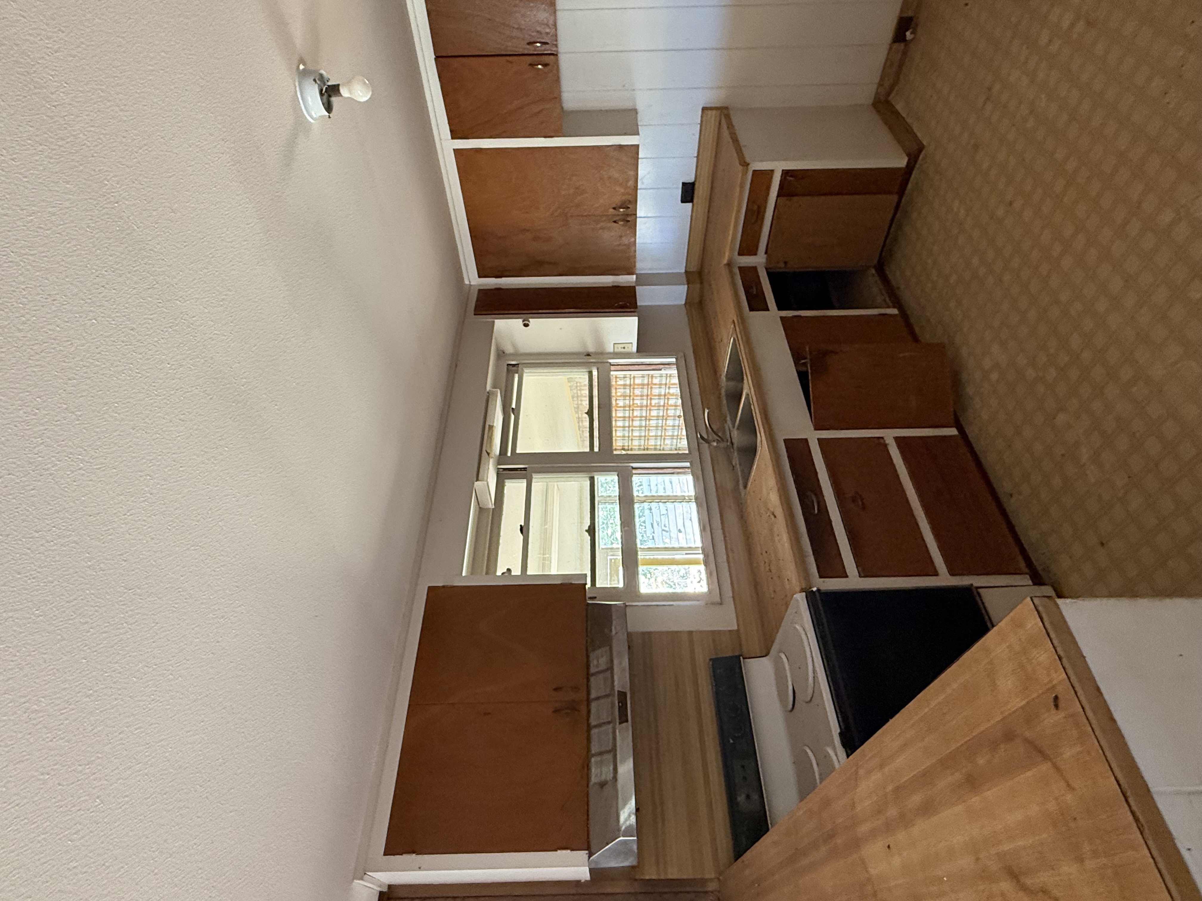 4661 Melemele Road Eleele, HI 96705 - Photo 8 of 15 a kitchen with stainless steel appliances granite countertop a stove and a sink