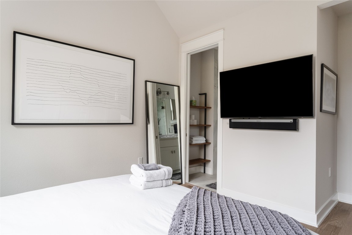 2906 Webberville Road, Unit 2 Austin, TX 78702 - Photo 14 of 21 a living room with a flat screen tv and a toilet
