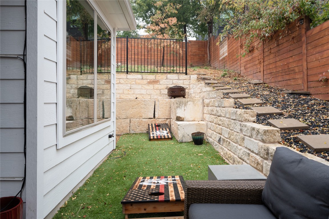 2906 Webberville Road, Unit 2 Austin, TX 78702 - Photo 19 of 21 a view of yard from a corridor