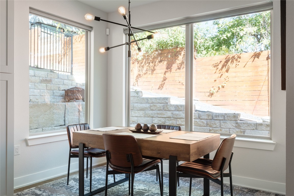 2906 Webberville Road, Unit 2 Austin, TX 78702 - Photo 6 of 21 a view of a dining room with furniture window and outside view
