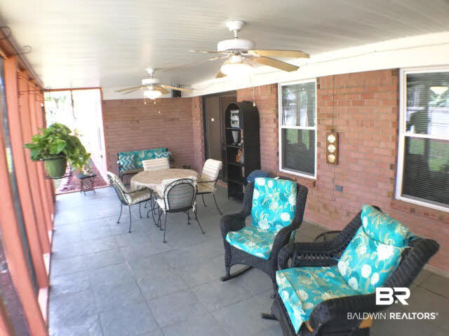 103 Vega Circle Daphne, AL 36526 - Photo 22 of 23 rear screened porch