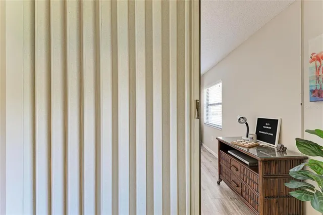 a view of a balcony with furniture