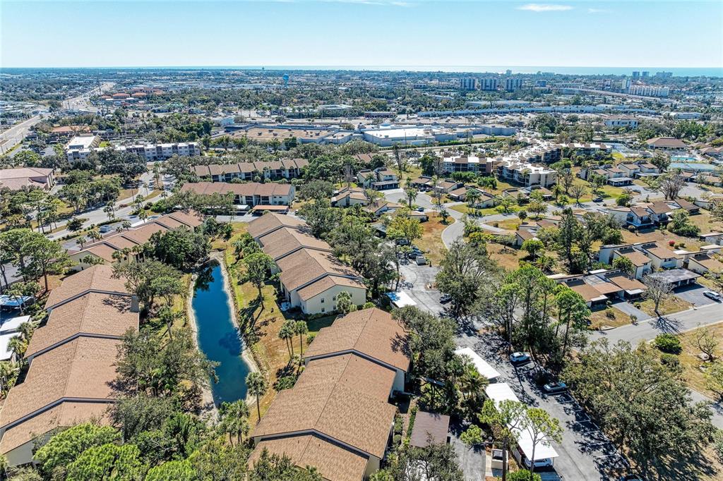 756 White Pine Tree Road, Unit 210 Venice, FL 34285 - Photo 31 of 55 an aerial view of residential houses with outdoor space